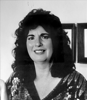 ISABEL “DOLLY” CAPARROS